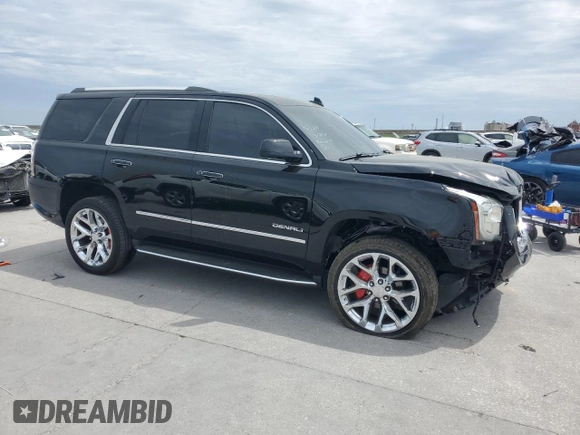 2017 GMC Yukon Denali with VIN 1GKS1CKJ9HR211240, listed as a Copart auction lot 50973015 with 95,484 mi miles and Salvage Title. Bid and sale history available at carsss.com. Image 4.