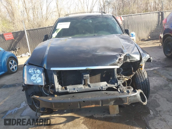 2006 GMC Envoy Denali with VIN 1GKET63M962355586, listed as a IAAI auction lot 41881023 with 235,506 mi miles. Bid and sale history available at carsss.com. Image 12.