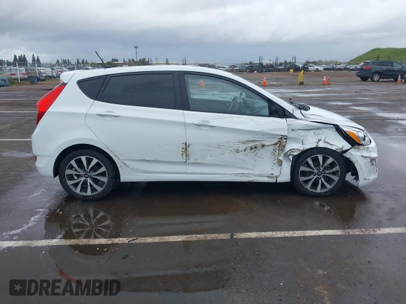 2016 Hyundai Accent Sport with VIN KMHCU5AE4GU249974, listed as a IAAI auction lot 41916351 with 127,692 mi miles. Bid and sale history available at carsss.com. Image 13.