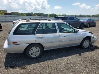 1998 Ford Escort SE with VIN 3FAFP15P4WR240362, listed as a Copart auction lot 63453095 with 220,855 mi miles and Salvage title. Bid and sale history available at DreamBid. Image 3.
