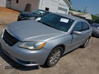 2013 Chrysler 200 Touring with VIN 1C3CCBBB6DN721743, listed as a IAAI auction lot 42079415 with 194,243 mi miles. Bid and sale history available at carsss.com. Image 2.