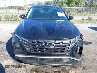 2022 Hyundai Tucson SE with VIN 5NMJA3AE2NH079952, listed as a IAAI auction lot 40908823 with 8,203 mi miles and . Bid and sale history available at carsss.com. Image 12.