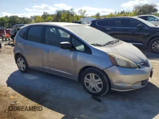 2009 Honda Fit with VIN JHMGE88229S006581, listed as a Copart auction lot 49776565 with Not Provided miles and Salvage Title. Bid and sale history available at carsss.com. Image 4.