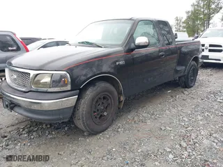 2000 Ford F-150 Work Series with VIN 1FTRX07W7YKA28407, listed as a IAAI auction lot 41551494 with 1 mi miles. Bid and sale history available at carsss.com. Image 2.