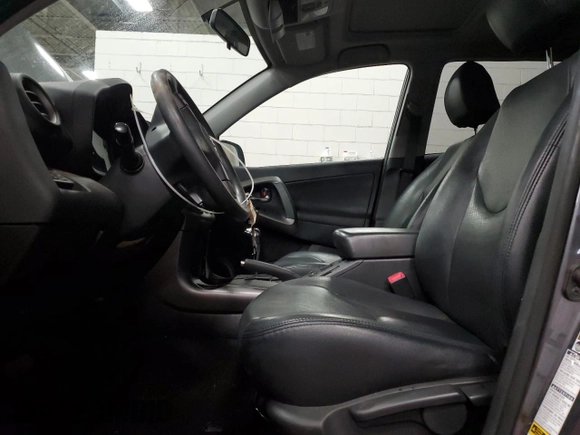 2010 Toyota RAV4 Sport with VIN JTMRK4DV8A5085818, listed as a Copart auction lot 51799295 with 115,109 mi miles and Salvage title. Bid and sale history available at DreamBid. Image 7.