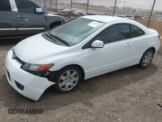 2007 Honda Civic Cpe LX with VIN 2HGFG12677H558299, listed as a IAAI auction lot 41936988 with 195,278 mi miles. Bid and sale history available at carsss.com. Image 2.
