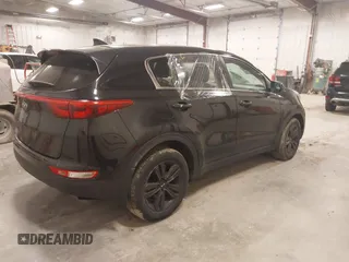 2018 Kia Sportage LX with VIN KNDPM3AC6J7417371, listed as a IAAI auction lot 41879390 with 112,944 mi miles and . Bid and sale history available at carsss.com. Image 4.
