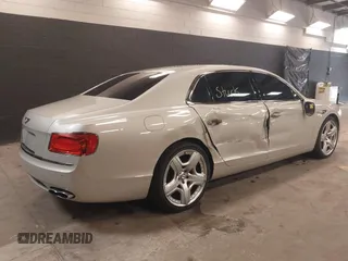 2015 Bentley Flying Spur V8 with VIN SCBET9ZAXFC042716, listed as a IAAI auction lot 42621840 with 47,299 mi miles and . Bid and sale history available at DreamBid. Image 4.