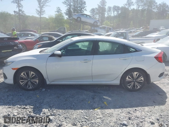 2018 Honda Civic EX-L z VIN 19XFC1F70JE000634, wystawiony jako IAAI lot #42020912 z przebiegiem 156 030 mil mil oraz . Historia ofert i sprzedaży dostępna na DreamBid. Obrazek 14.