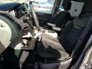 2016 Dodge Grand Caravan SXT with VIN 2C4RDGCG4GR176028, listed as a Copart auction lot 54920445 with 157,131 mi miles and Salvage Title. Bid and sale history available at DreamBid. Image 7.