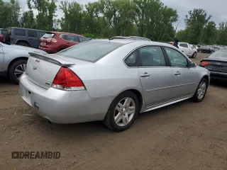 2014 Chevrolet Impala LTZ z VIN 2G1WC5E31E1184046, wystawiony jako Copart lot #62561395 z przebiegiem 207 989 mil mil oraz Czysty tytuł • Clean title. Historia ofert i sprzedaży dostępna na DreamBid. Obrazek 3.