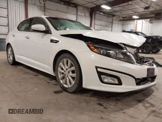 2015 Kia Optima EX z VIN 5XXGN4A7XFG502833, wystawiony jako IAAI lot #42193532 z przebiegiem 180 272 mil mil oraz . Historia ofert i sprzedaży dostępna na DreamBid. Obrazek 1.