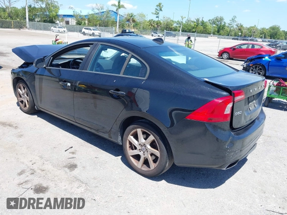 2014 Volvo S60 T5 with VIN YV1612FS1E2294154, listed as a IAAI auction lot 42046636 with 165,257 mi miles. Bid and sale history available at carsss.com. Image 3.