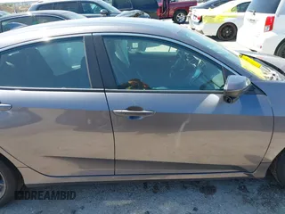 2019 Honda Civic EX-L z VIN 19XFC1F70KE205694, wystawiony jako IAAI lot #41976645 z przebiegiem 43 653 mil mil oraz . Historia ofert i sprzedaży dostępna na DreamBid. Obrazek 13.