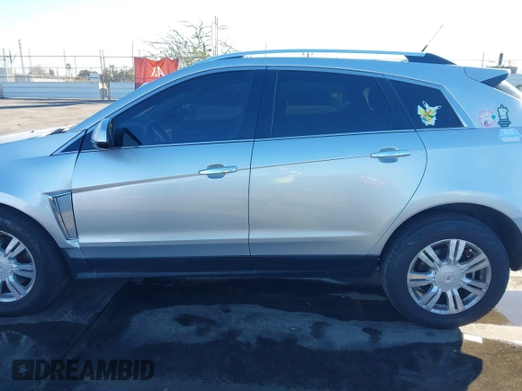 2013 Cadillac SRX Luxury Collection with VIN 3GYFNGE36DS591211, listed as a IAAI auction lot 41319932 with 174,059 mi miles. Bid and sale history available at carsss.com. Image 14.