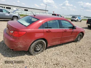 2010 Chrysler Sebring Limited with VIN 1C3CC5FD1AN197099, listed as a Copart auction lot 59128825 with 85,736 mi miles and Salvage title. Bid and sale history available at DreamBid. Image 3.