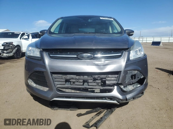 2013 Ford Escape SEL с VIN 1FMCU9H91DUD38428, выставлен на аукционе Copart как лот 57466025 с пробегом 106 858 миль миль и Списание • Salvage title. История ставок и продаж доступна на DreamBid. Изображение 5.