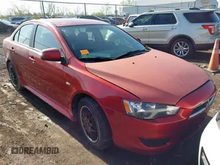 2012 Mitsubishi Lancer ES with VIN JA32U2FUXCU029360, listed as a IAAI auction lot 42121394 with 166,586 mi miles. Bid and sale history available at carsss.com. Image 1.