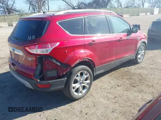 2014 Ford Escape Titanium with VIN 1FMCU9J98EUC24857, listed as a IAAI auction lot 41973037 with 160,634 mi miles. Bid and sale history available at carsss.com. Image 4.
