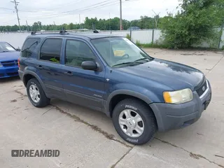 2001 Ford Escape XLT with VIN 1FMCU04161KB80235, listed as a IAAI auction lot 42486604 with 143,151 mi miles and . Bid and sale history available at DreamBid. Image 1.