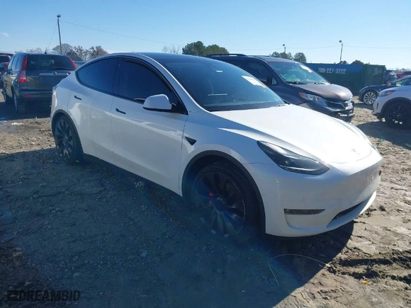 2022 Tesla Model Y Performance with VIN 7SAYGDEF7NF537401, listed as a IAAI auction lot 41540346 with NaN miles. Bid and sale history available at carsss.com. Image 1.