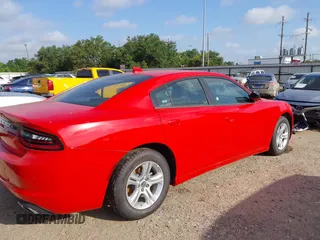 2023 Dodge Charger SXT with VIN 2C3CDXBG4PH550722, listed as a IAAI auction lot 39734322 with 5,503 mi miles. Bid and sale history available at carsss.com. Image 4.