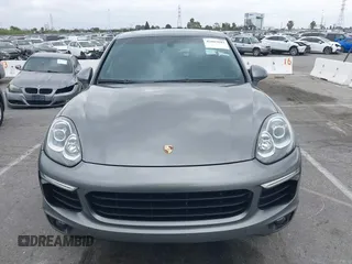 2016 Porsche Cayenne with VIN WP1AA2A27GKA15797, listed as a IAAI auction lot 42063043 with 81,464 mi miles. Bid and sale history available at carsss.com. Image 6.