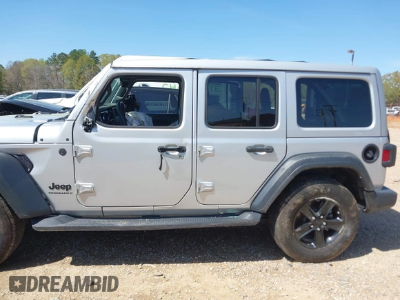 2023 Jeep Wrangler Sport with VIN 1C4HJXDG0PW582947, listed as a IAAI auction lot 41932930 with 19,670 mi miles and . Bid and sale history available at DreamBid. Image 14.