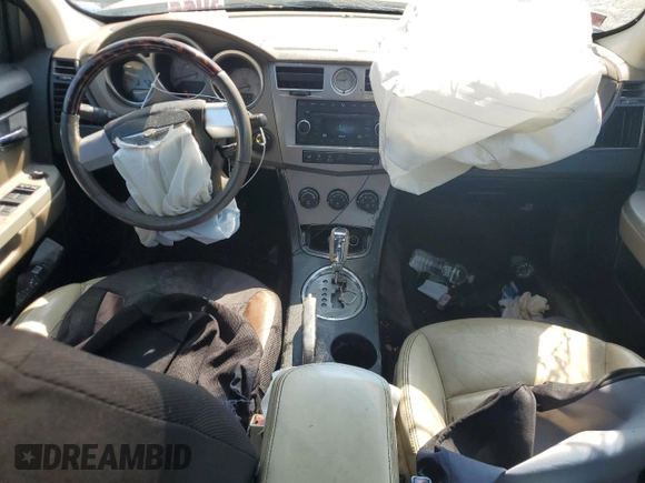 2009 Chrysler Sebring Limited with VIN 1C3LC56V39N566582, listed as a Copart auction lot 70522454 with 148,113 mi miles and Salvage title. Bid and sale history available at DreamBid. Image 8.