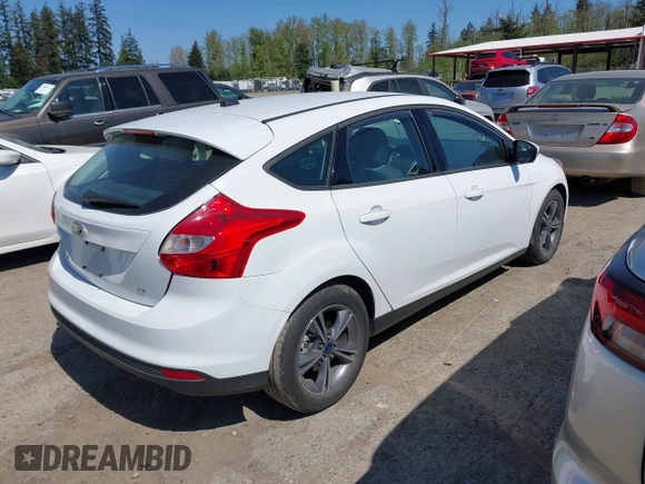 2014 Ford Focus SE with VIN 1FADP3K22EL454565, listed as a IAAI auction lot 42054653 with 19,118 mi miles. Bid and sale history available at carsss.com. Image 4.