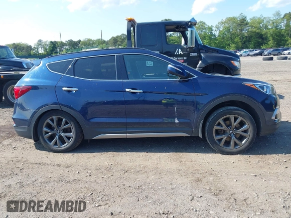 2018 Hyundai Santa Fe Ultimate with VIN 5XYZWDLA3JG571432, listed as a IAAI auction lot 42395245 with 69,330 mi miles and . Bid and sale history available at DreamBid. Image 13.