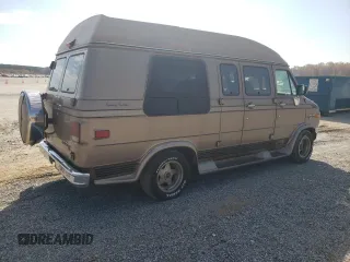 1995 Chevrolet Chevy Van z VIN 1GBEG25K9SF175004, wystawiony jako Copart lot #77952694 z przebiegiem 217 649 mil mil oraz Szkoda całkowita • Salvage title. Historia ofert i sprzedaży dostępna na DreamBid. Obrazek 3.