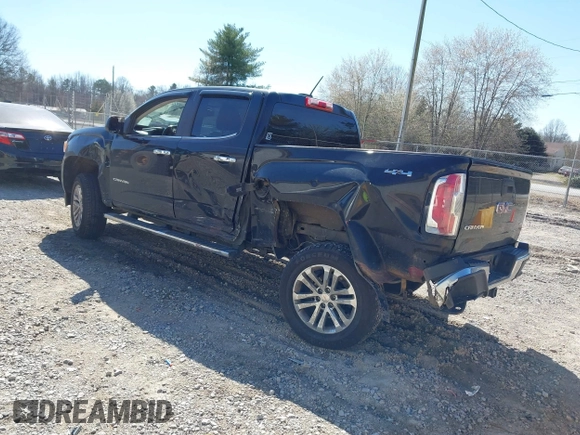 2015 GMC Canyon 2WD SLT with VIN 1GTG5CE35F1249224, listed as a IAAI auction lot 41697796 with 180,230 mi miles. Bid and sale history available at carsss.com. Image 3.