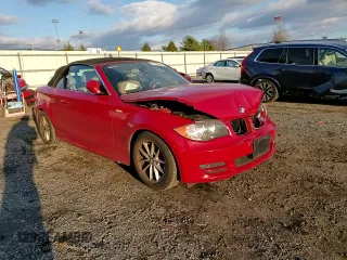 2010 BMW 1 Series 128i with VIN WBAUL7C54AVJ77712, listed as a Copart auction lot 83158294 with Not provided miles and Salvage title. Bid and sale history available at DreamBid. Image 11.
