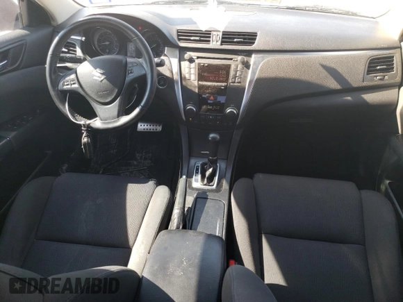 2011 Suzuki Kizashi SE z VIN JS2RE9A34B6111601, wystawiony jako Copart lot #75945784 z przebiegiem 128 926 mil mil oraz Szkoda całkowita • Salvage title. Historia ofert i sprzedaży dostępna na DreamBid. Obrazek 8.