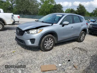 2016 Mazda CX-5 Sport with VIN JM3KE4BY4G0791154, listed as a Copart auction lot 57561945 with 124,086 mi miles and Clean title. Bid and sale history available at DreamBid. Image 1.