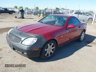 1999 Mercedes-Benz SLK 230/320 with VIN WDBKK47F5XF112125, listed as a IAAI auction lot 42207615 with 93,962 mi miles and . Bid and sale history available at DreamBid. Image 2.