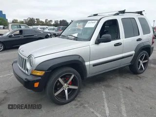 2007 Jeep Liberty Sport with VIN 1J4GK48K67W511199, listed as a IAAI auction lot 42079058 with 156,699 mi miles. Bid and sale history available at carsss.com. Image 2.