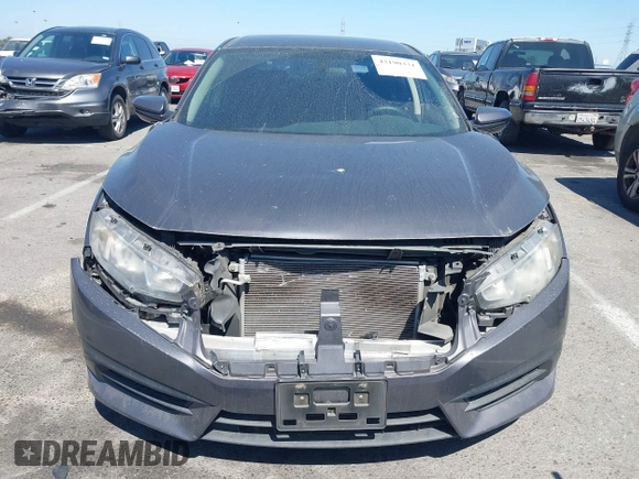 2017 Honda Civic LX with VIN 2HGFC2F56HH525914, listed as a IAAI auction lot 42190331 with 139,464 mi miles and . Bid and sale history available at DreamBid. Image 12.