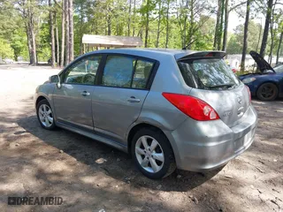 2010 Nissan Versa 1.8 SL with VIN 3N1BC1CP5AL357518, listed as a IAAI auction lot 42090152 with 149,821 mi miles. Bid and sale history available at carsss.com. Image 3.