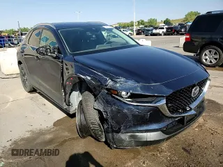2023 Mazda CX-30 Premium Plus with VIN 3MVDMBEY9PM500907, listed as a Copart auction lot 70871494 with 38,599 mi miles and Salvage title. Bid and sale history available at DreamBid. Image 14.