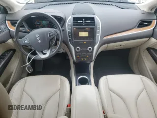 2019 Lincoln MKC Select z VIN 5LMCJ2D99KUL39648, wystawiony jako Copart lot #53755895 z przebiegiem 57 623 mil mil oraz Szkoda całkowita • Salvage title. Historia ofert i sprzedaży dostępna na DreamBid. Obrazek 8.