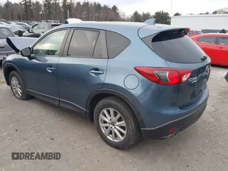 2015 Mazda CX-5 Touring with VIN JM3KE4CY1F0545305, listed as a IAAI auction lot 41234599 with 92,791 mi miles. Bid and sale history available at carsss.com. Image 3.