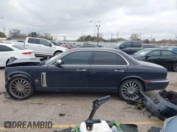 2007 Jaguar XJ with VIN SAJXA73C97TH14362, listed as a IAAI auction lot 41305716 with 120,924 mi miles and . Bid and sale history available at DreamBid. Image 14.