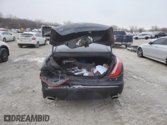 2013 Jaguar XJ with VIN SAJWA1C70D8V41578, listed as a Copart auction lot 89080585 with 76,063 mi miles and Salvage Title. Bid and sale history available at DreamBid. Image 6.