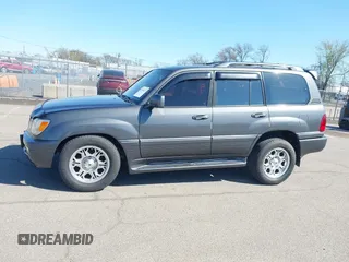 2003 Lexus LX with VIN JTJHT00W033531066, listed as a IAAI auction lot 41969617 with 209,710 mi miles. Bid and sale history available at carsss.com. Image 14.