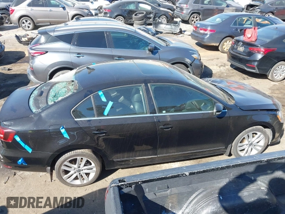 2017 Volkswagen Jetta SEL z VIN 3VWL17AJ5HM246543, wystawiony jako IAAI lot #41650614 z przebiegiem 112 168 mil mil oraz . Historia ofert i sprzedaży dostępna na DreamBid. Obrazek 13.