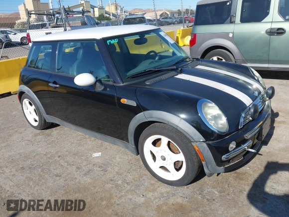 2002 MINI Hardtop with VIN WMWRC33402TC32985, listed as a IAAI auction lot 42608636 with 159,996 mi miles and . Bid and sale history available at DreamBid. Image 1.
