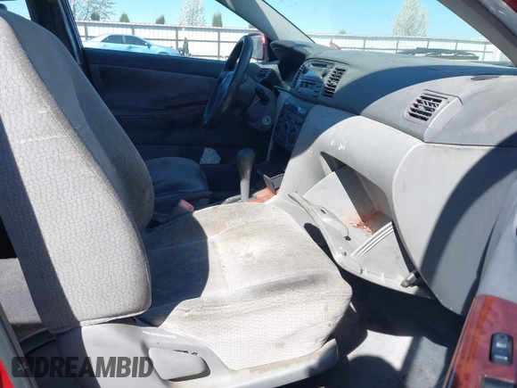 2004 Toyota Corolla CE with VIN JTDBR38E442046280, listed as a IAAI auction lot 39261107 with 212,717 mi miles and . Bid and sale history available at DreamBid. Image 5.