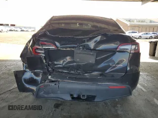 2022 Tesla Model Y Performance with VIN 7SAYGDEF5NF339965, listed as a Copart auction lot 62187545 with 93,156 mi miles and Salvage title. Bid and sale history available at DreamBid. Image 6.